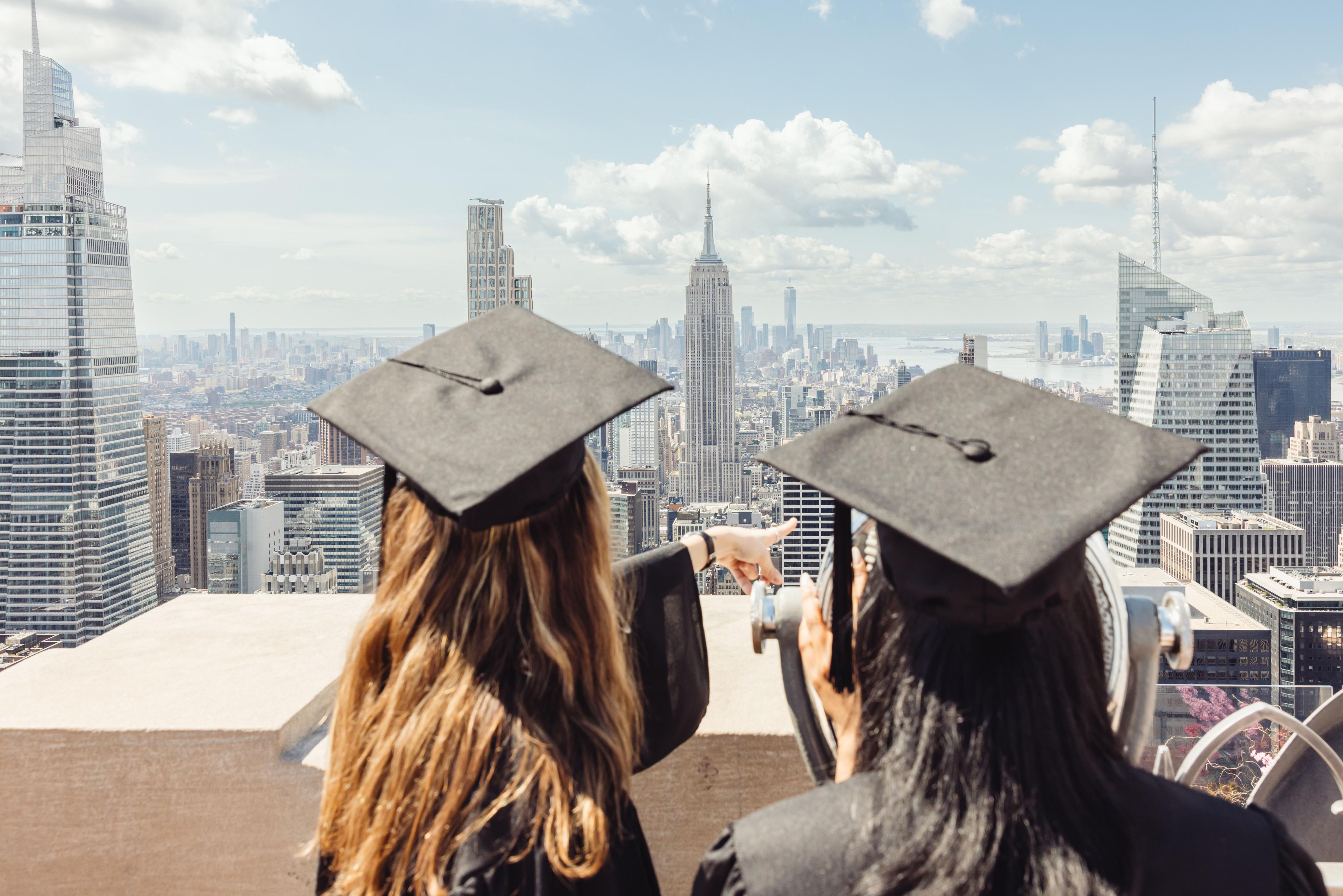 a graduate at top of the rock