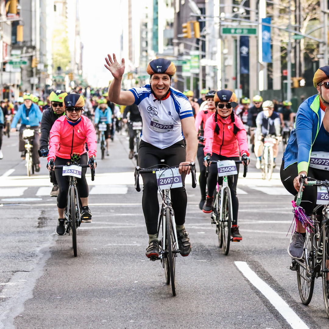 Group of people riding their bikes during the TD Five Boro Bike Tour