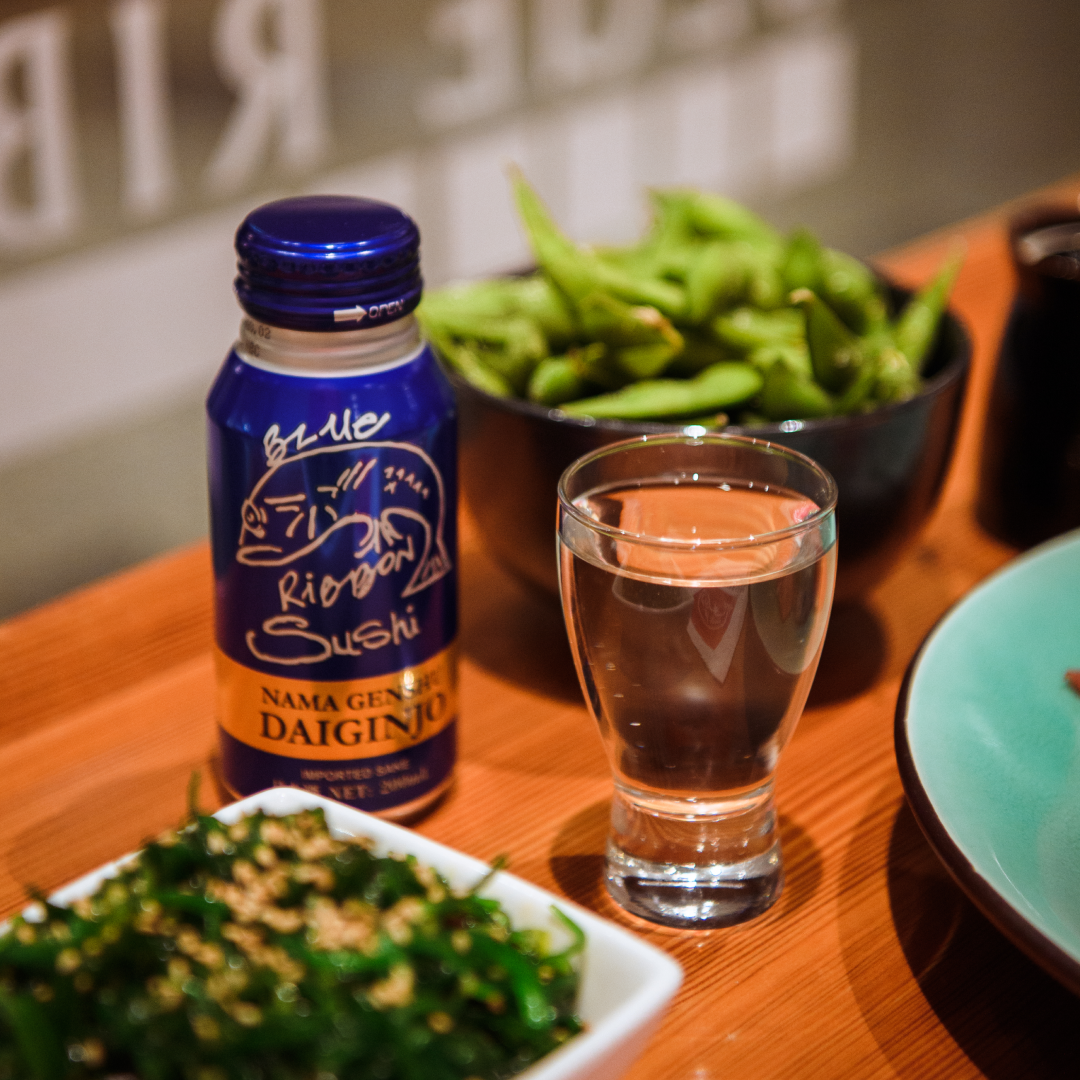 A bottle and glass of sake from Blue Ribbon Sushi at Rockefeller Center