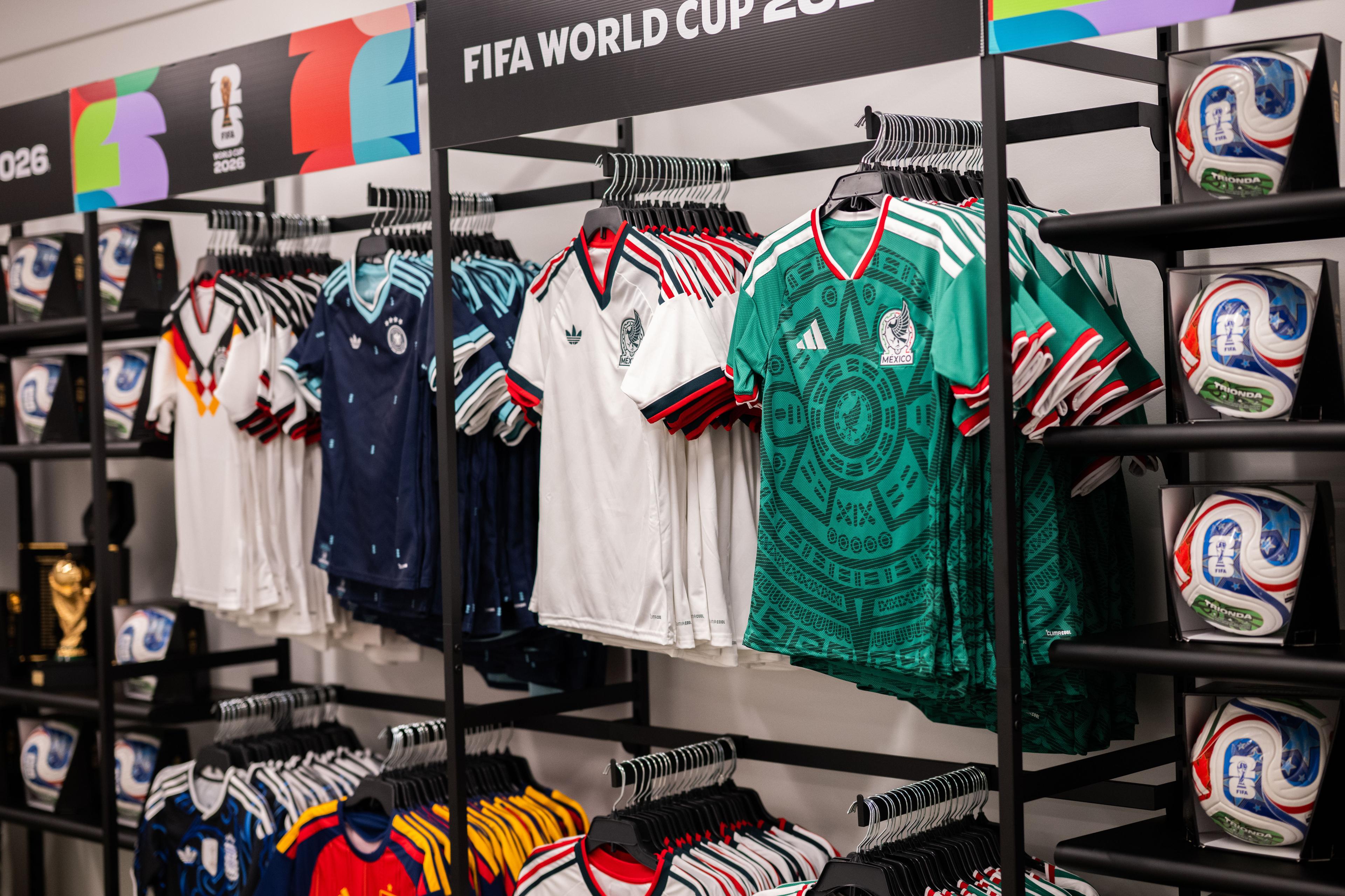 fifa retail merch jerseys on a display shelf