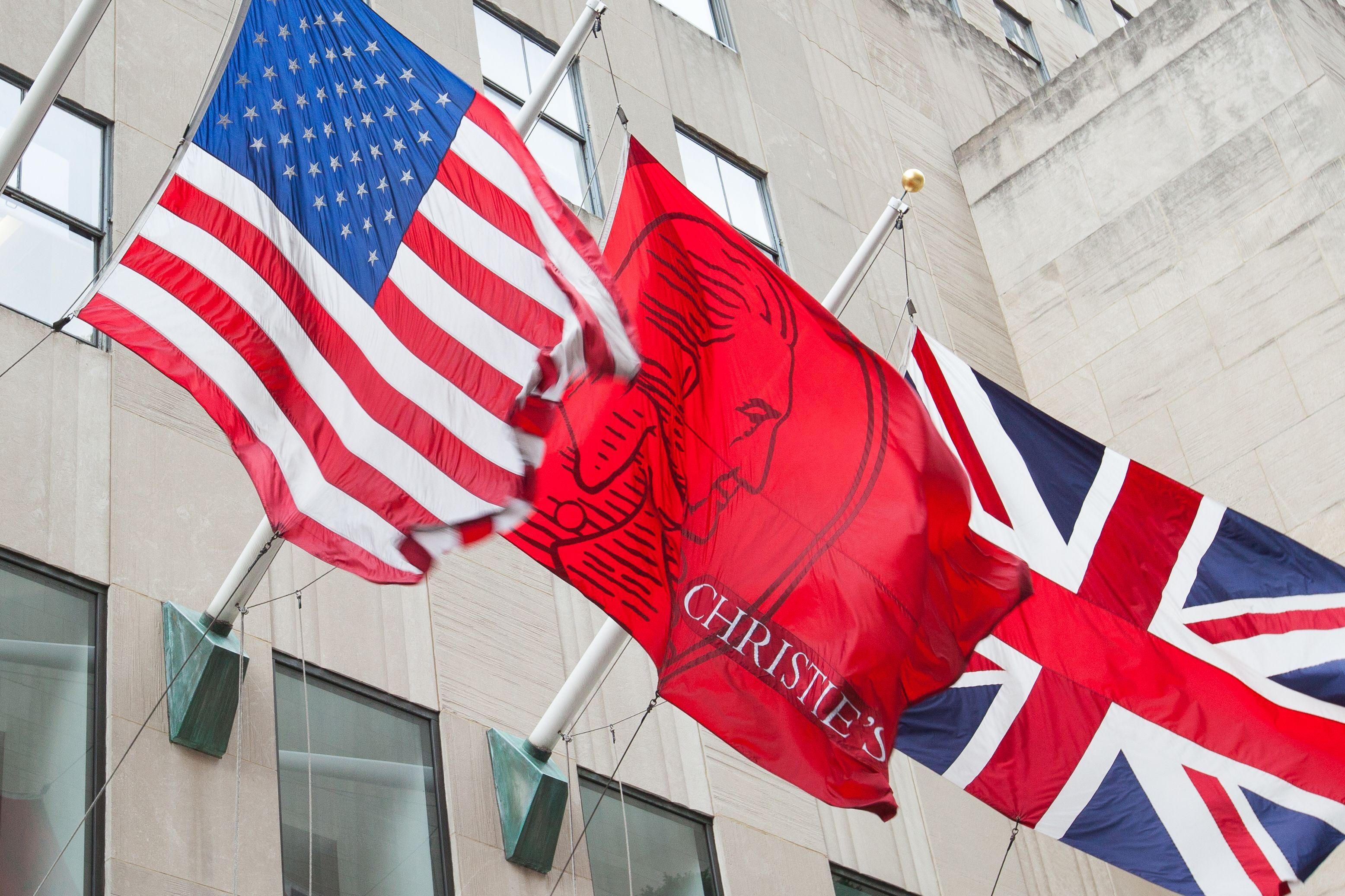 Christie's flag next to American and English flag