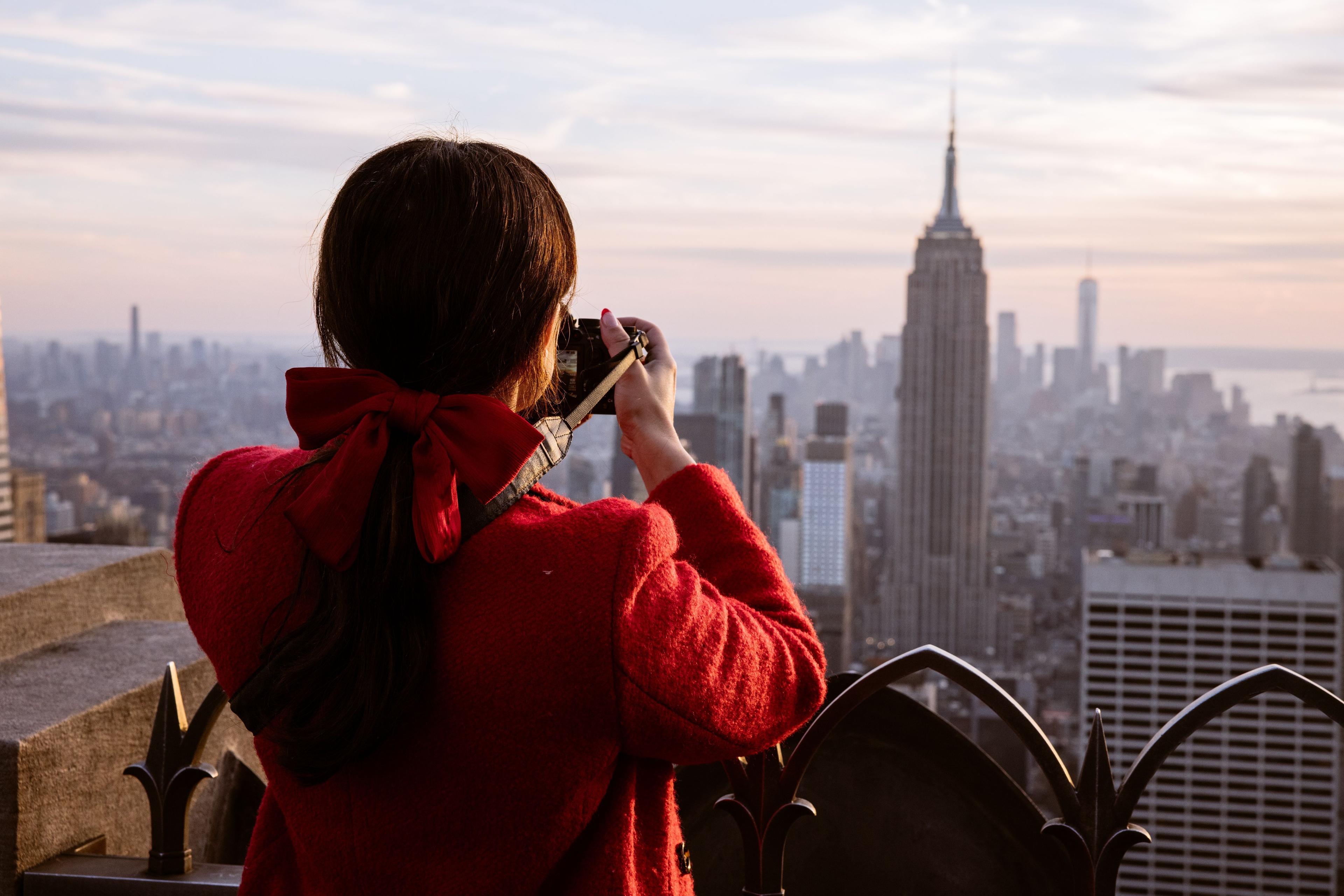 Girl taking a photo of the view