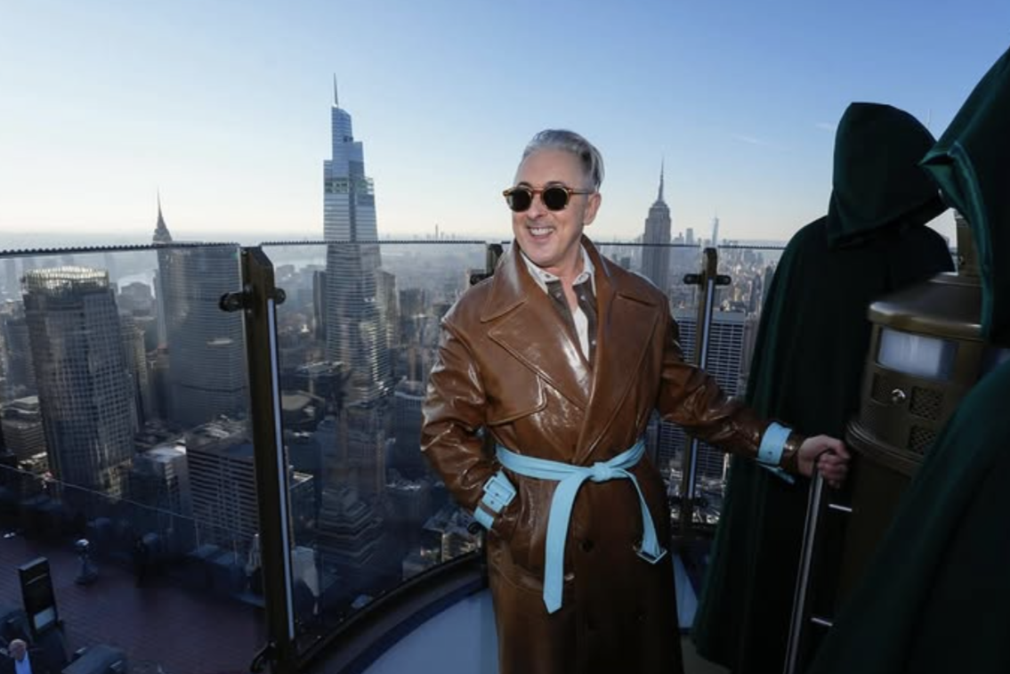 Alan Cumming on skylift at top of the rock