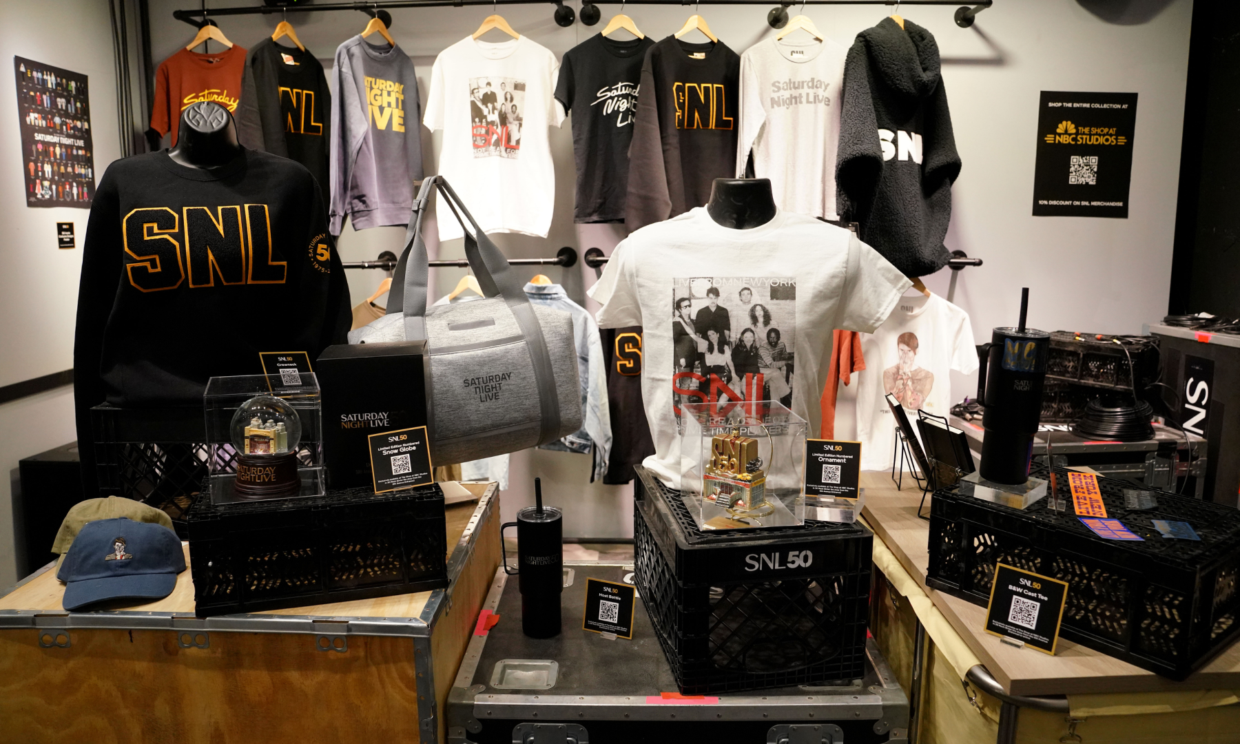 A display of various merch available at the 'Live from New York: The SNL50 Experience'
