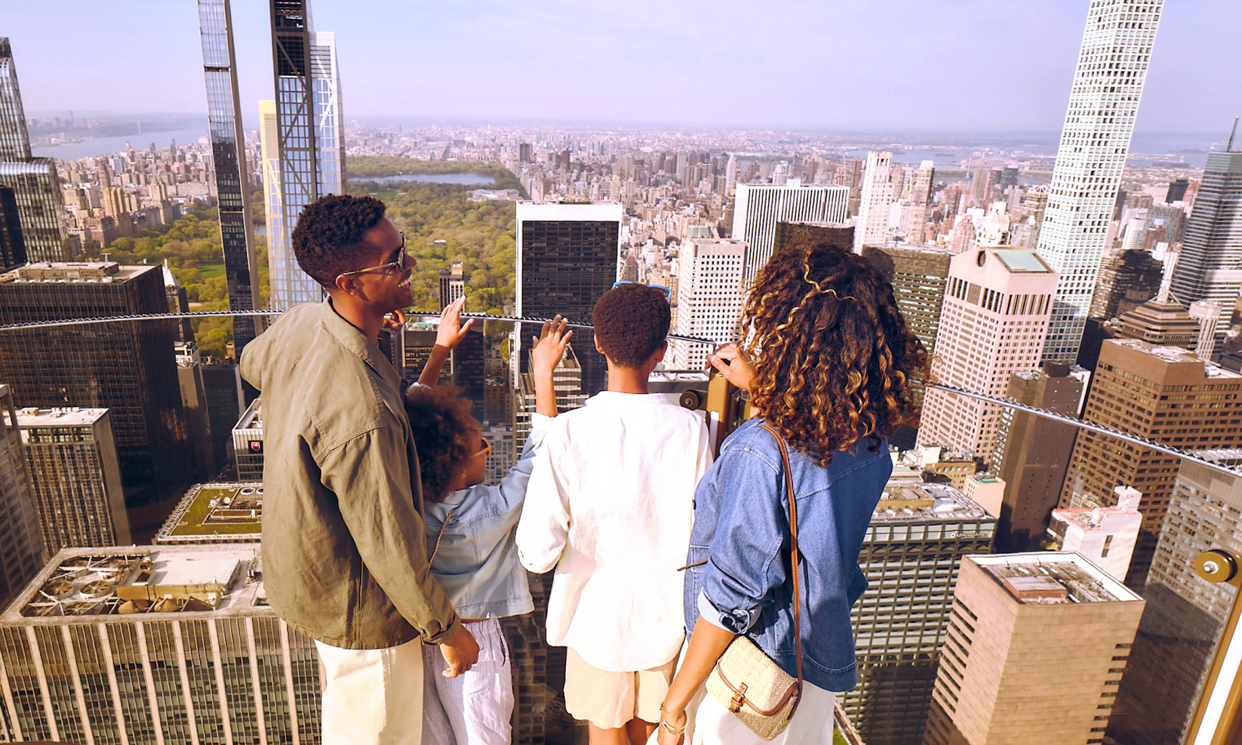 family at top of the rock