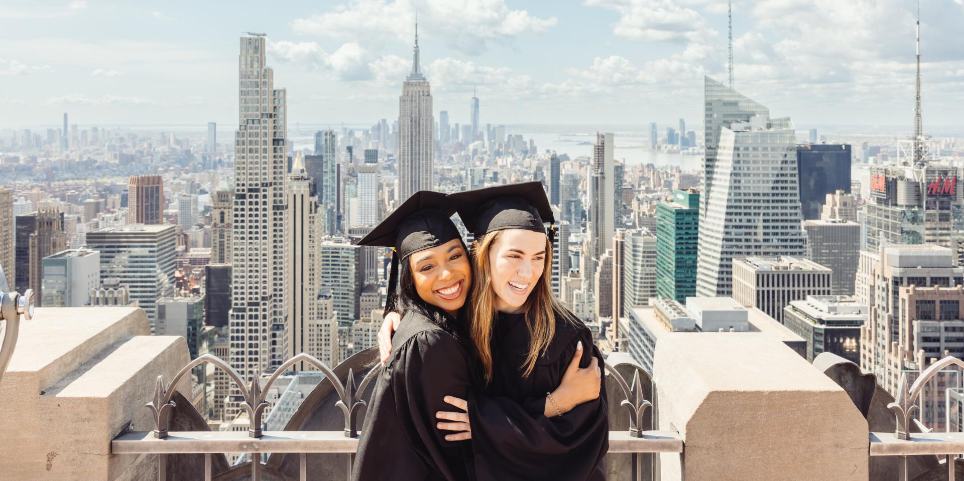 Graduate in cap and gown at Top of the Rock