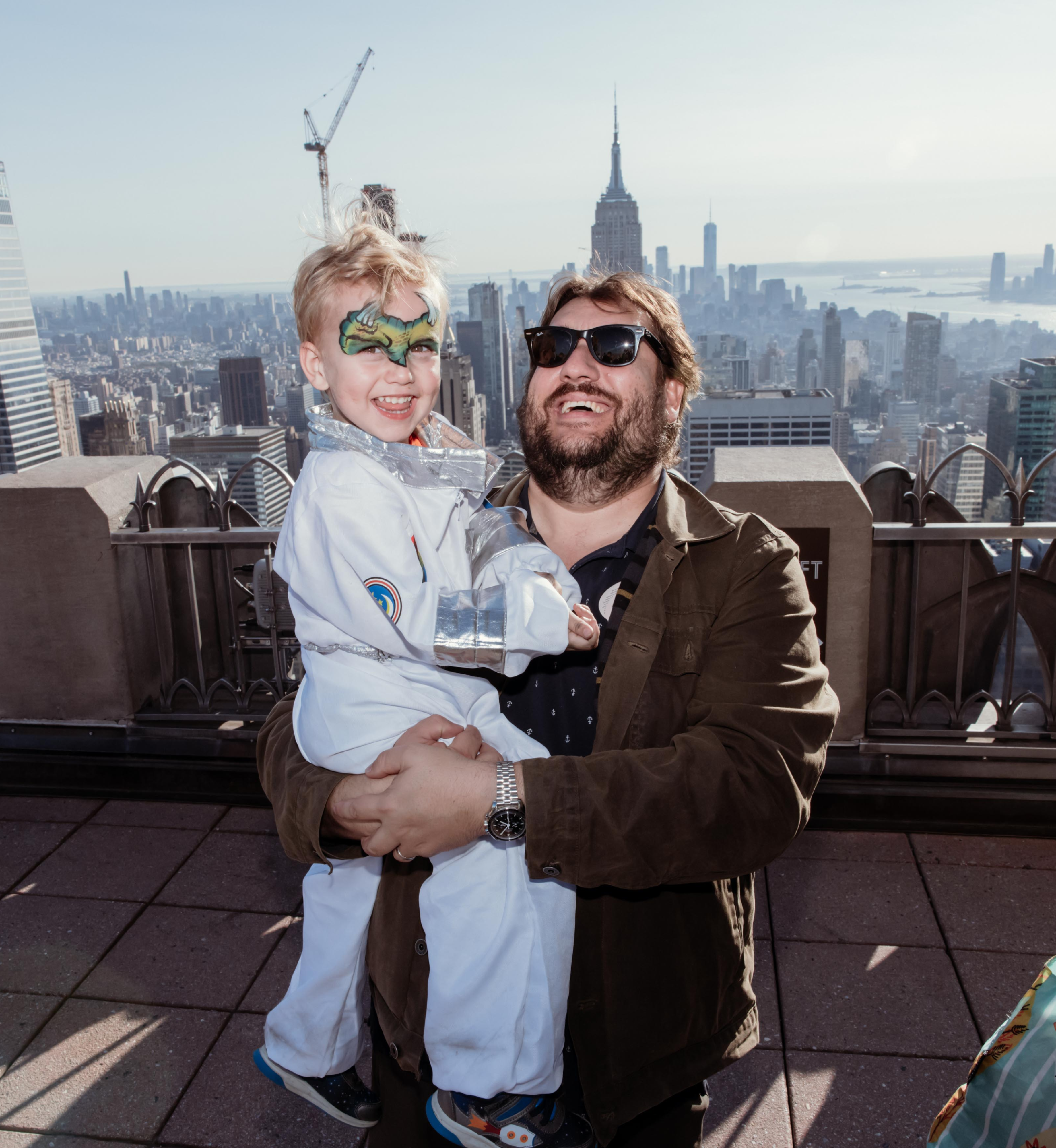 A father and son at Top of the Rock for family-friendly Halloween activities