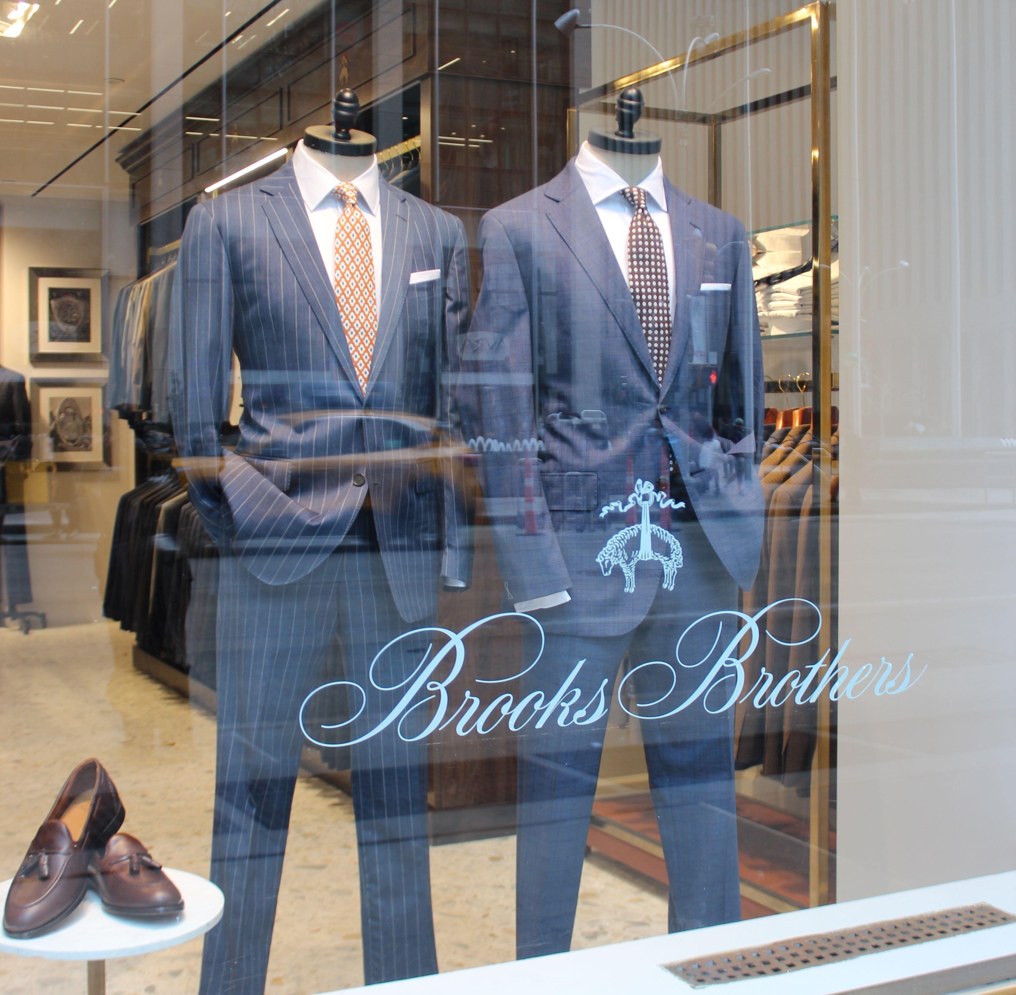 male and female Brooks Brothers models in business attire