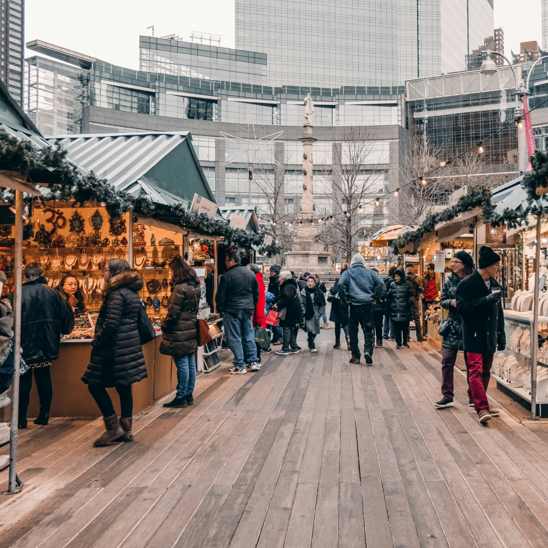 People shopping at the holiday market in Columbus Circle