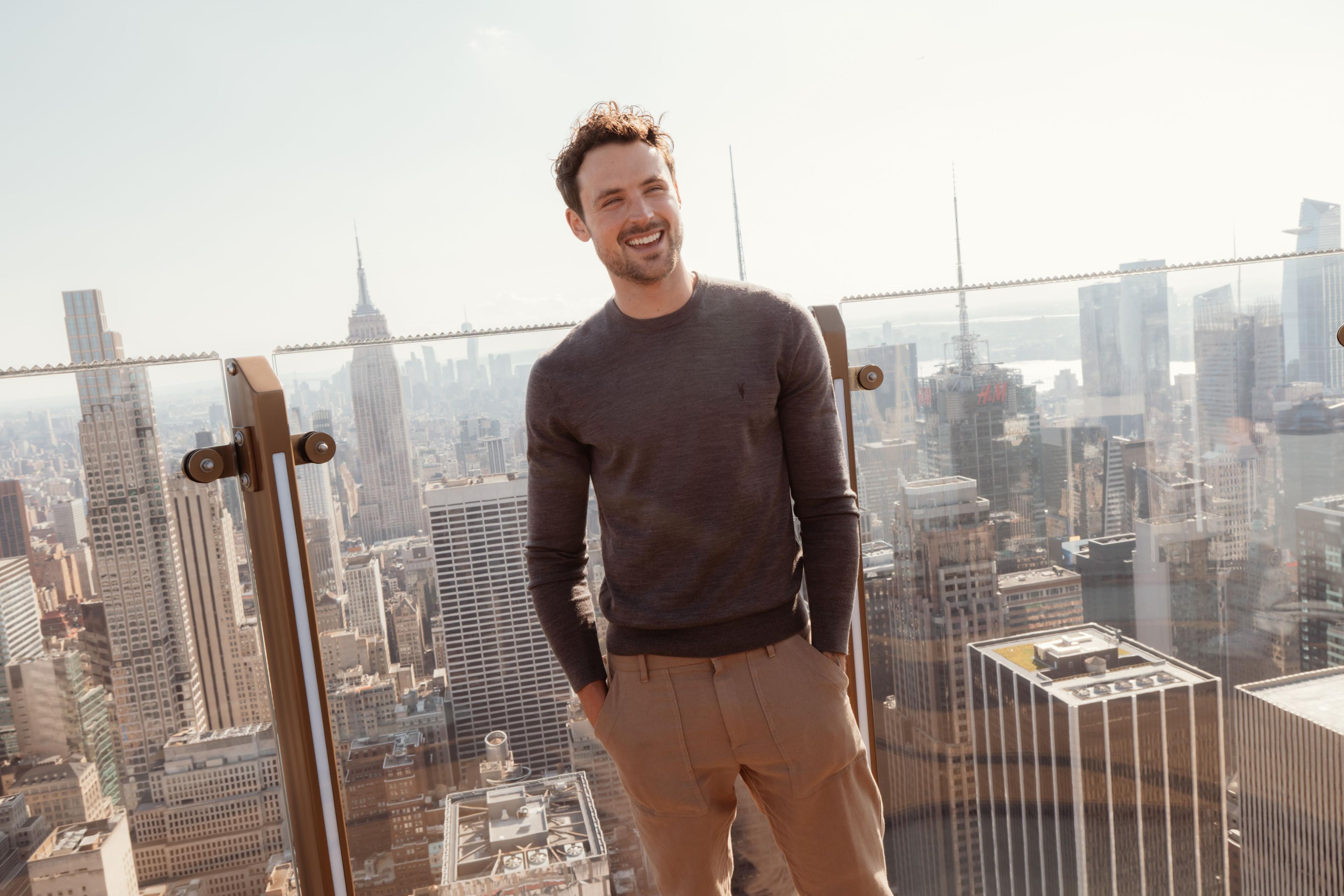 dylon efron on skylift at top of the rock