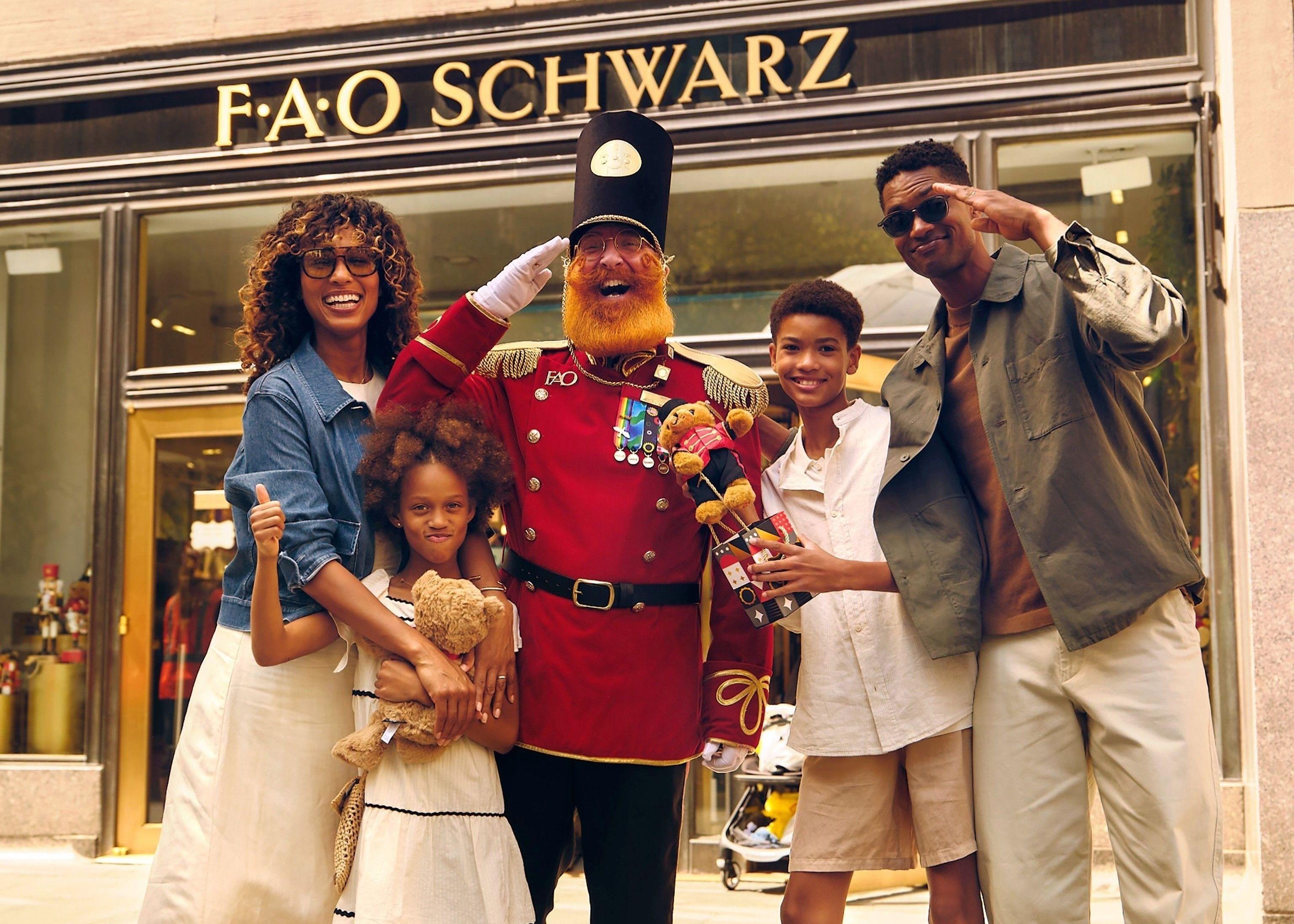 Family posing with a toy soldier at FAO Schwarz